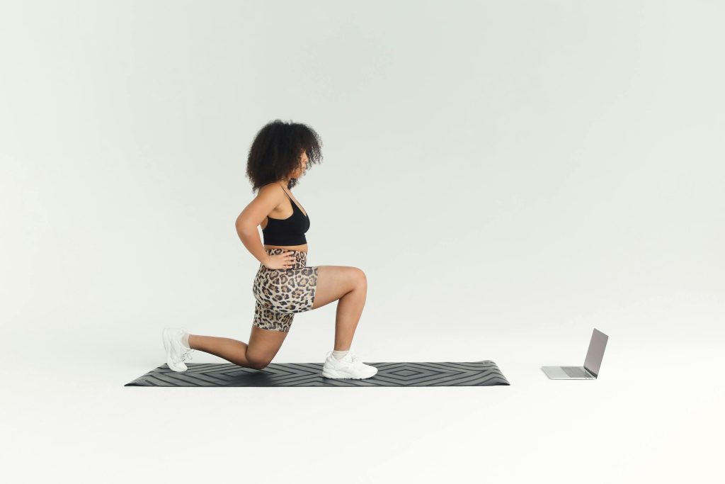 Woman Watching Online Workout Video from Pexels